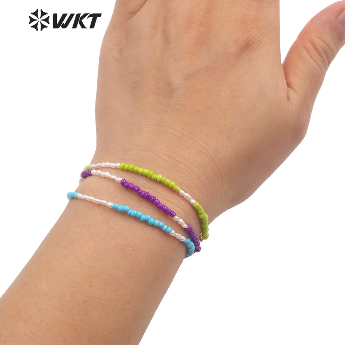 WT-MPB079 Women Elegant Tiny 2 - Ceramic Link Bracelet recension och pris